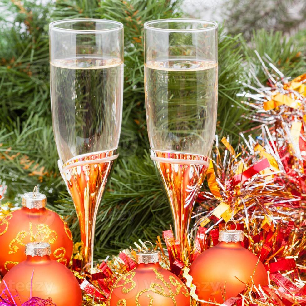 Two glasses with gold Xmas decorations and tree 3 photo