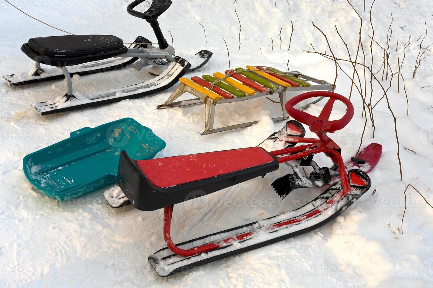 different sledge on snow photo