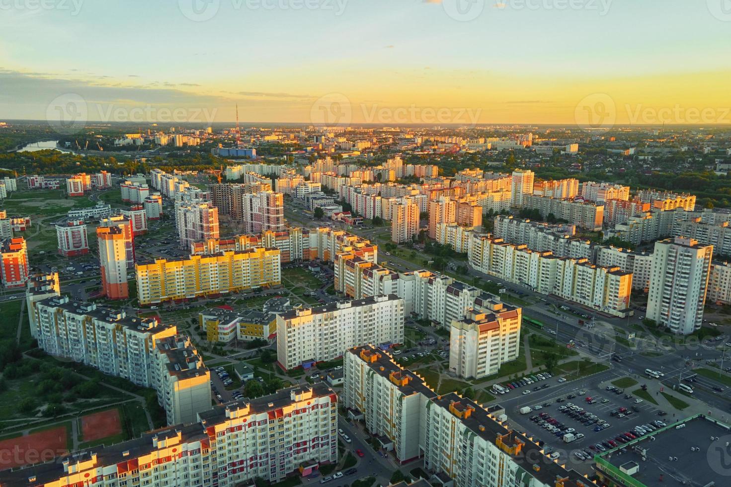 Aerial view of city residential district at sunset photo