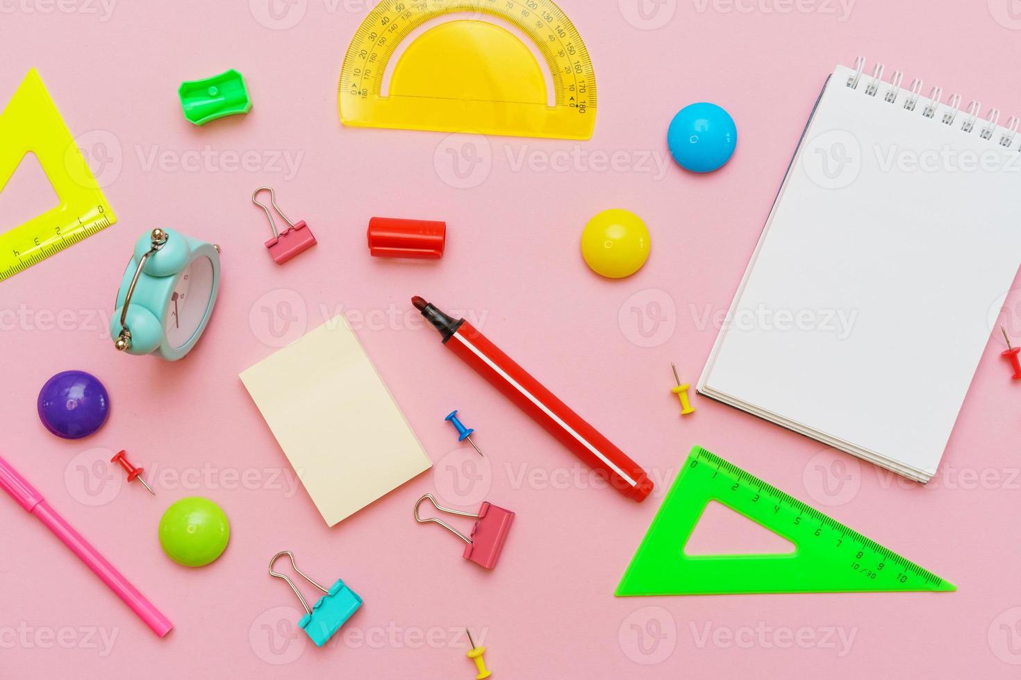 Supplies creative tools for school creative work on pink background photo