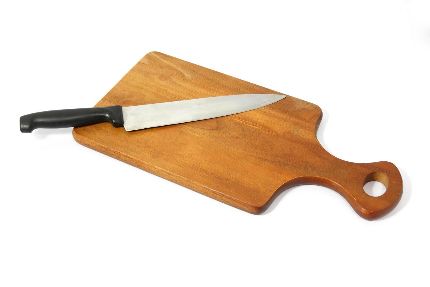 cuchillo de carnicero y fondo blanco foto