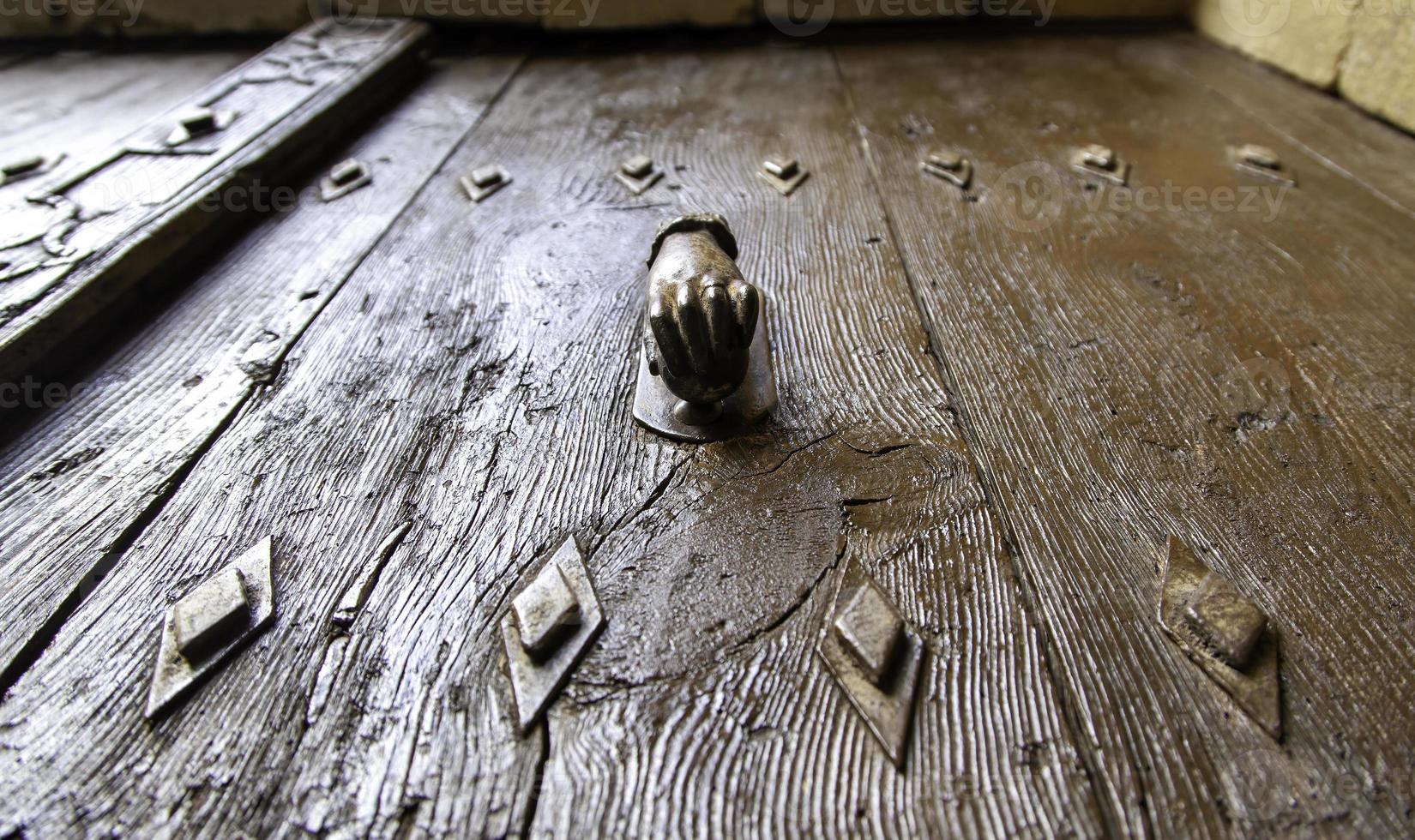 Old knocker in the shape of a hand photo