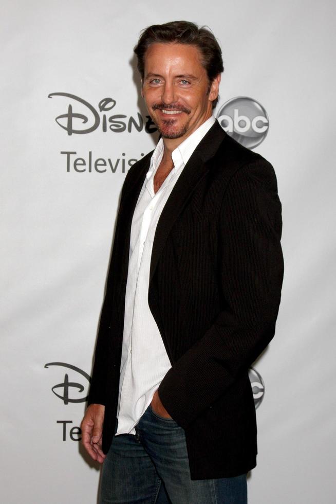 LOS ANGELES - AUG 7 - Charles Mesure arriving at the Disney  ABC Television Group 2011 Summer Press Tour Party at Beverly Hilton Hotel on August 7, 2011 in Beverly Hills, CA photo