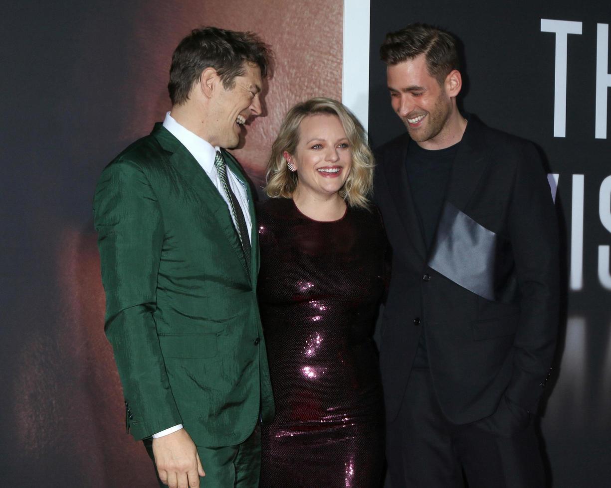 LOS ANGELES - FEB 24 - Jason Blum, Elisabeth Moss, and Oliver Jackson-Cohe at the The Invisible Man Premiere at the TCL Chinese Theater IMAX on February 24, 2020 in Los Angeles, CA photo