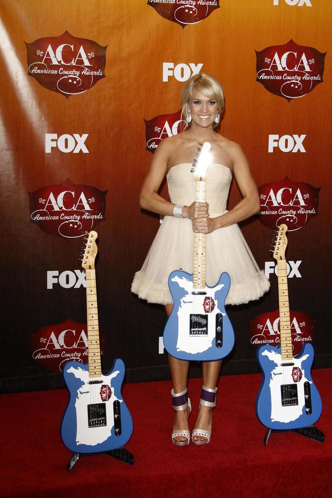 LOS ANGELES - DEC 5 - Carrie Underwood in the Press Room of the American Country Awards 2011 at MGM Grand Garden Arena on December 5, 2011 in Las Vegas, NV photo