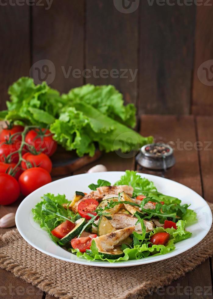 Salad of chicken breast with zucchini and cherry tomatoes photo