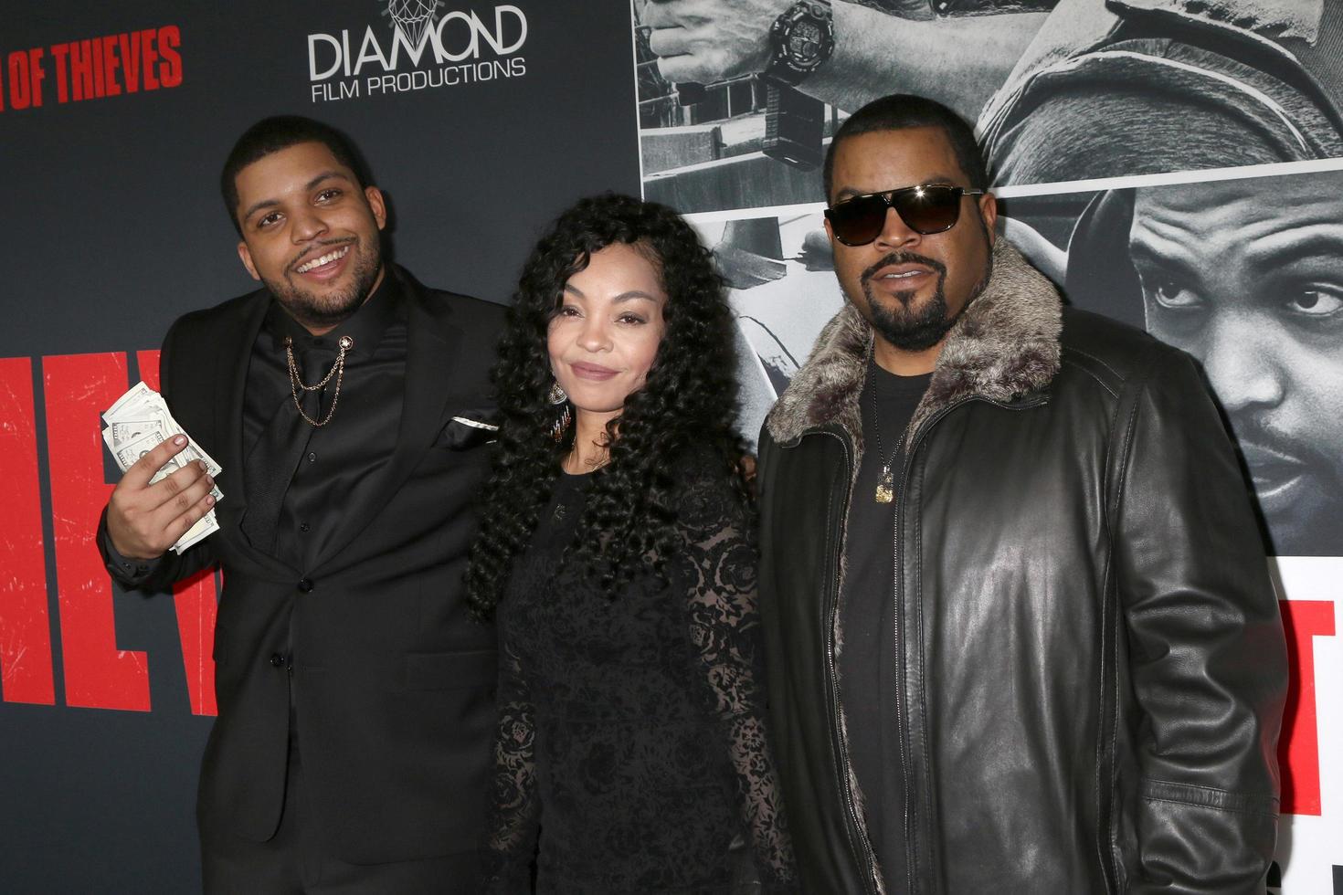 LOS ANGELES - JAN 17 - O Shea Jackson Jr, Kimberly Woodruff, O Shea Jackson, Ice Cube at the Den of Thieves Premiere at Regal LA Live Theaters on January 17, 2018 in Los Angeles, CA photo