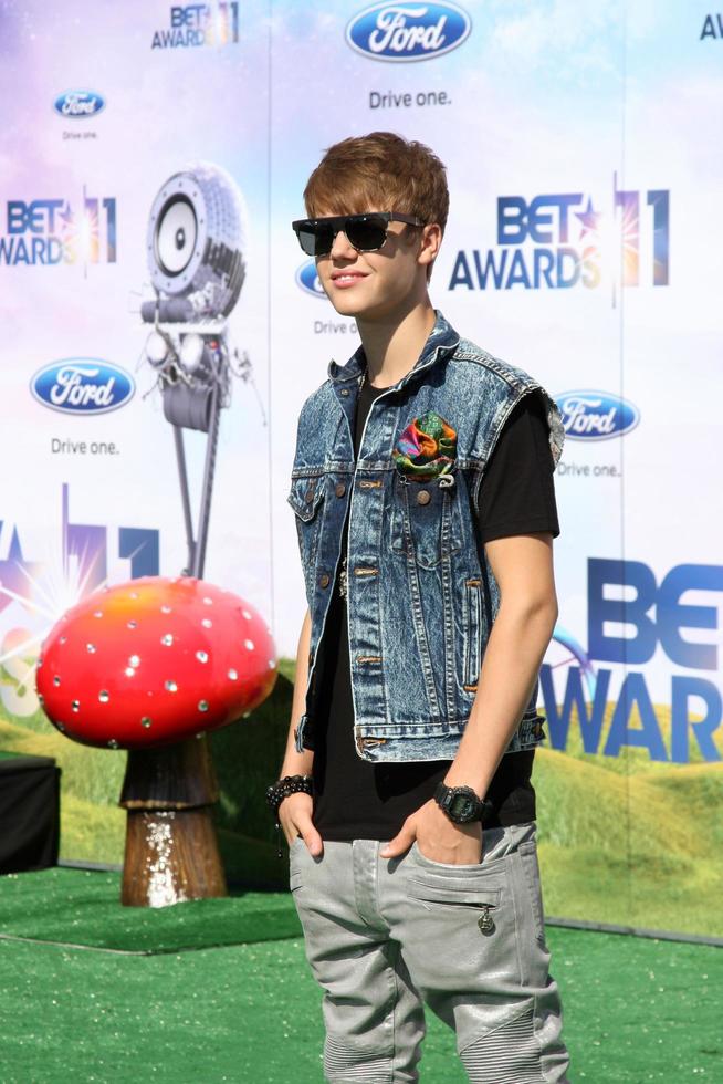 LOS ANGELES - JUN 26 - Justin Bieber arriving at the 11th Annual BET Awards at Shrine Auditorium on June 26, 2004 in Los Angeles, CA photo