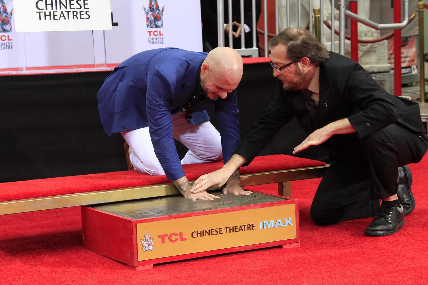 LOS ANGELES - DEC 14 - Pitbull at the Pitbull Hand and Footprint Ceremony at the TCL Chinese Theater IMAX on December 14, 2018 in Los Angeles, CA photo