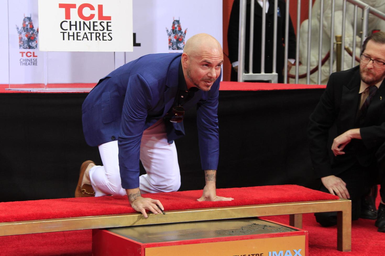 LOS ANGELES - DEC 14 - Pitbull at the Pitbull Hand and Footprint Ceremony at the TCL Chinese Theater IMAX on December 14, 2018 in Los Angeles, CA photo