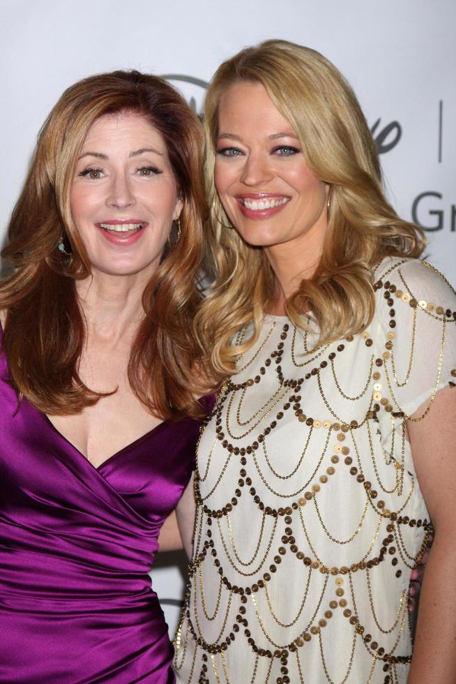 LOS ANGELES - AUG 7 - Dana Delany, Jeri Ryan arriving at the Disney  ABC Television Group 2011 Summer Press Tour Party at Beverly Hilton Hotel on August 7, 2011 in Beverly Hills, CA photo