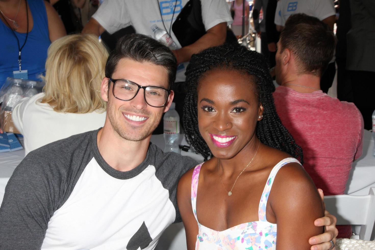 LOS ANGELES - AUG 23 - Adam Gregory, Kristolyn Lloyd at the Bold and Beautiful Fan Meet and Greet at the Farmers Market on August 23, 2013 in Los Angeles, CA photo