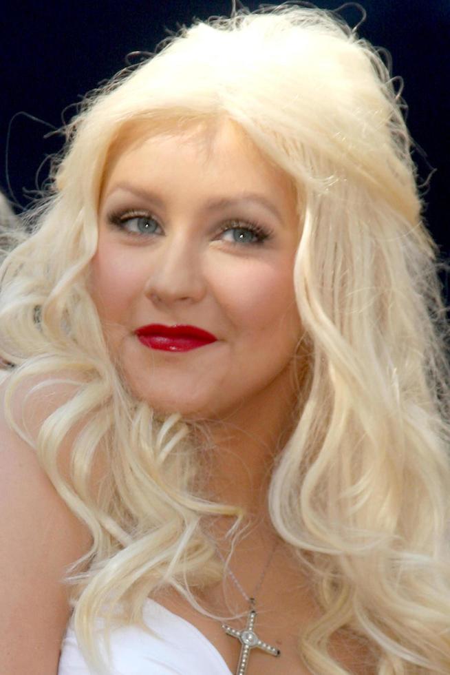 LOS ANGELES - NOV 15 - Christina Aguilera at the Hollywood Walk of Fame Star Ceremony for Christina Aguilera at Hard Rock Cafe Sidewalk, Hollywood and Highland on November 15, 2010 in Los Angeles, CA photo