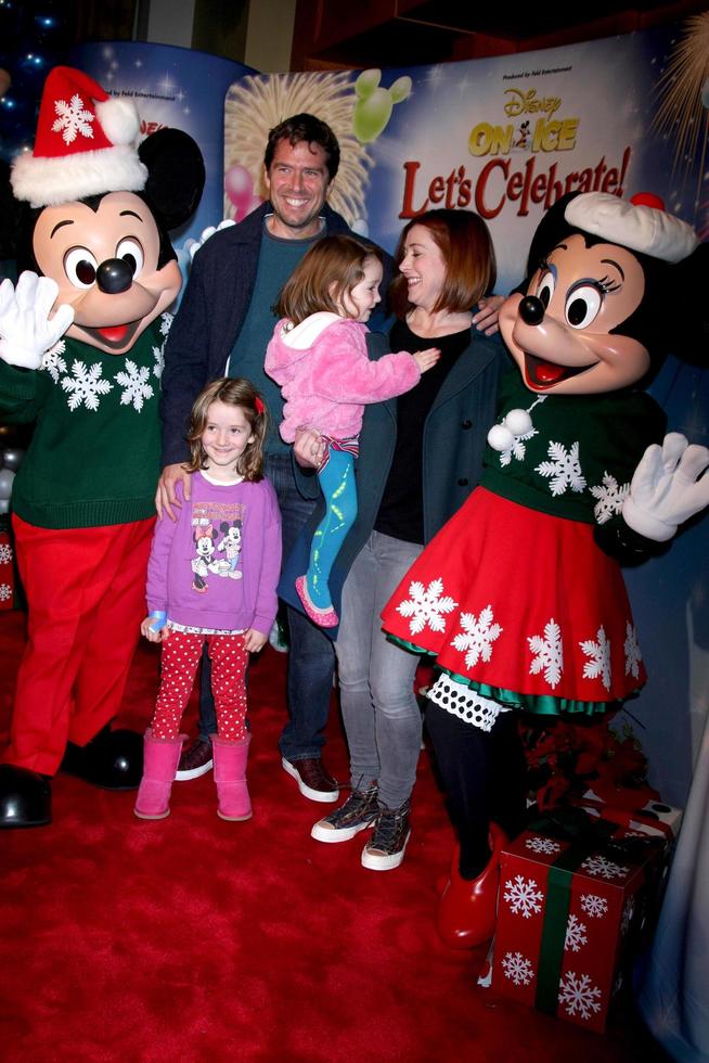 LOS ANGELES - DEC 11 - Alyson Hannigan, Alexis Denisof, Satyana Denisof, Keeva Denisof at the Disney on Ice Red Carpet Reception at the Staples Center on December 11, 2014 in Los Angeles, CA photo