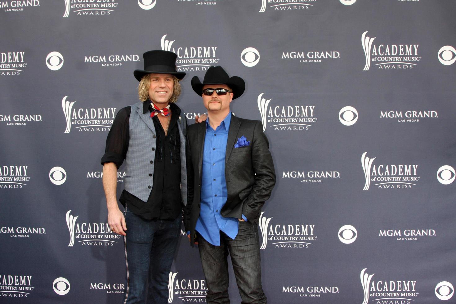 LAS VEGAS - APR 3 - Big and Rich arriving at the Academy of Country Music Awards 2011 at MGM Grand Garden Arena on April 3, 2010 in Las Vegas, NV photo