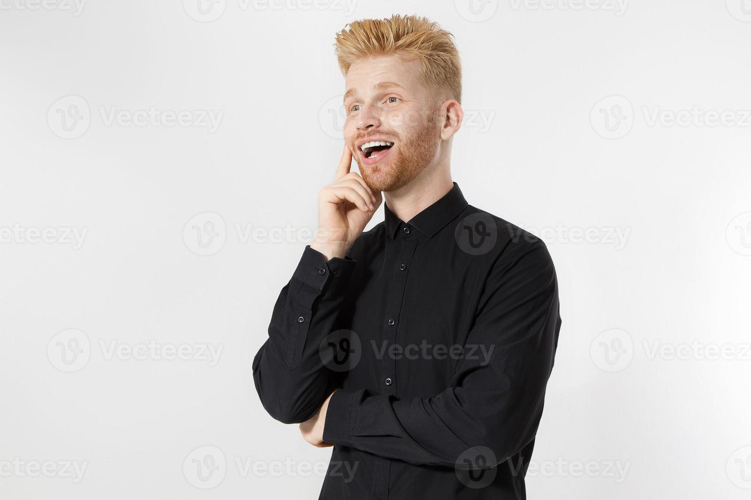 Happy Stylish guy in black shirt. Folded arms, copy space. Successful young, Entrepreneur concept. Redheaded man with red beard. Start up, young founder concept isolate on white background photo