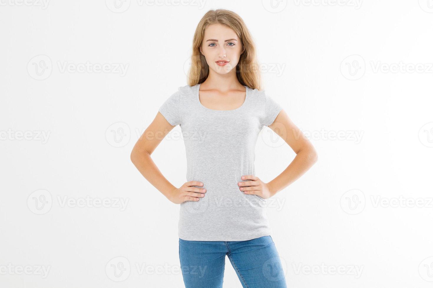 Young blonde woman with fit slim body in blank template t shirt and jeans isolated on white background. Skin and hair care. Copy space and mock up photo