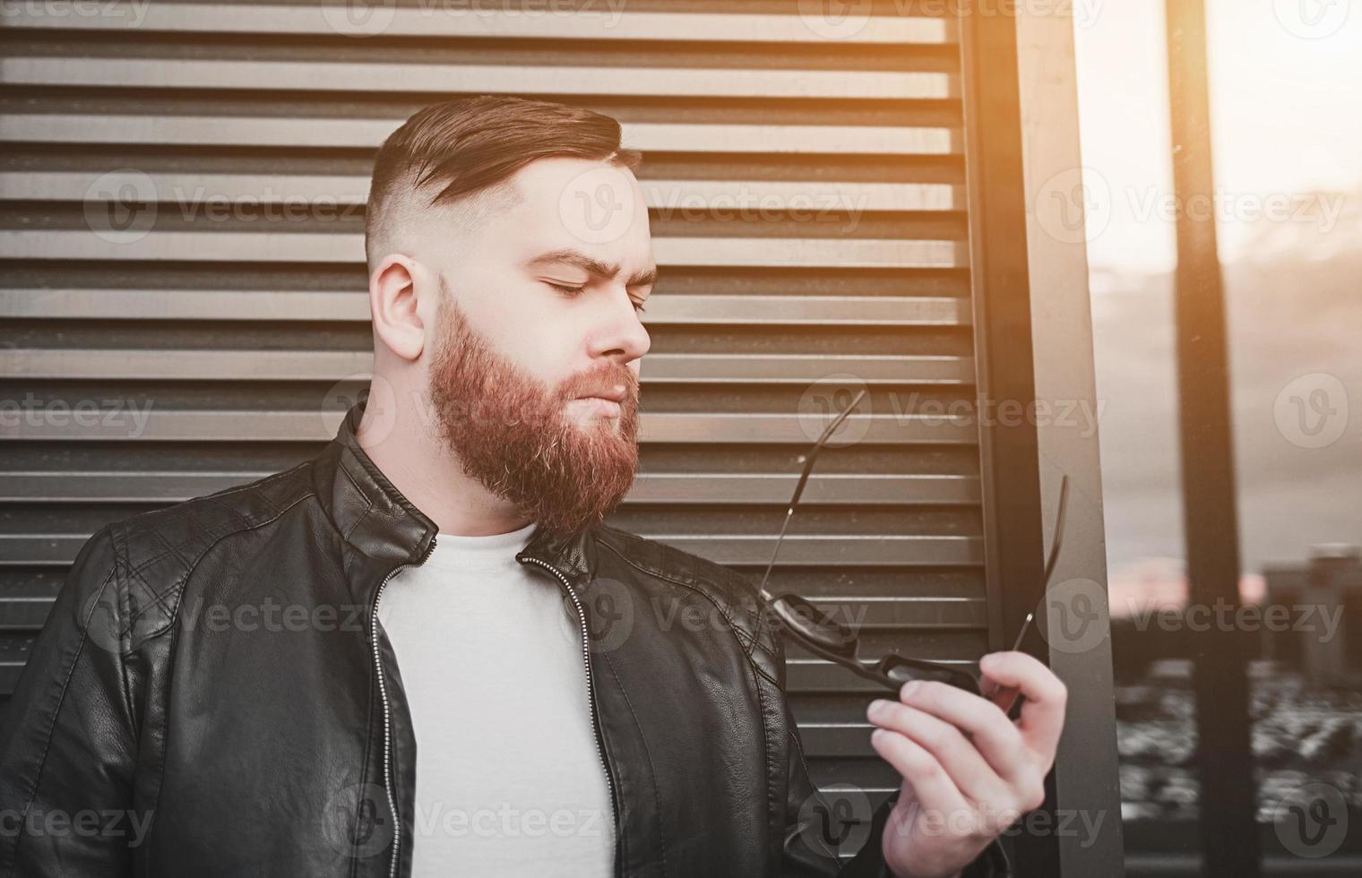 Cool man in a leather jacket photo