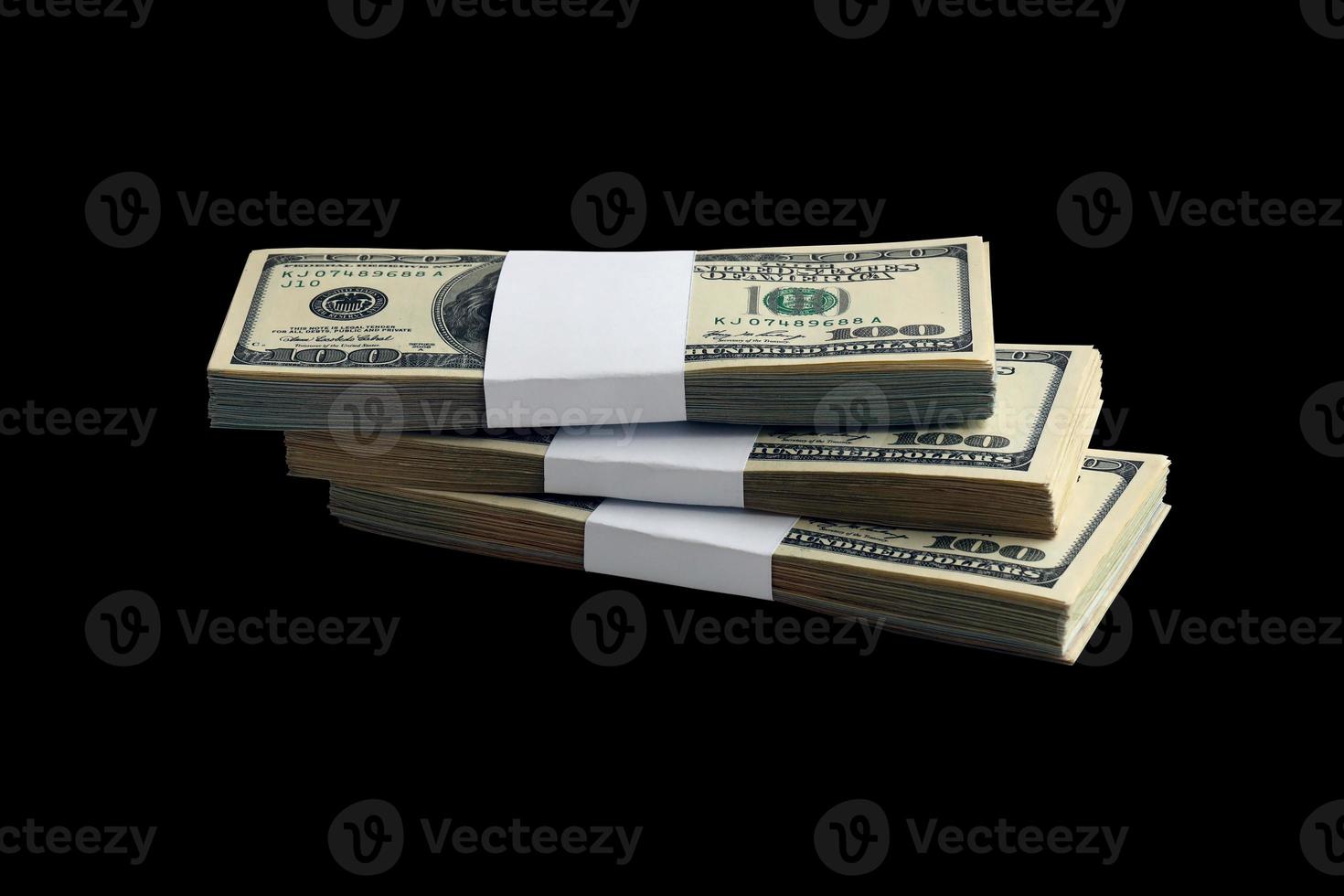 Bundle of US dollar bills isolated on black. Pack of american money with high resolution on perfect black background photo
