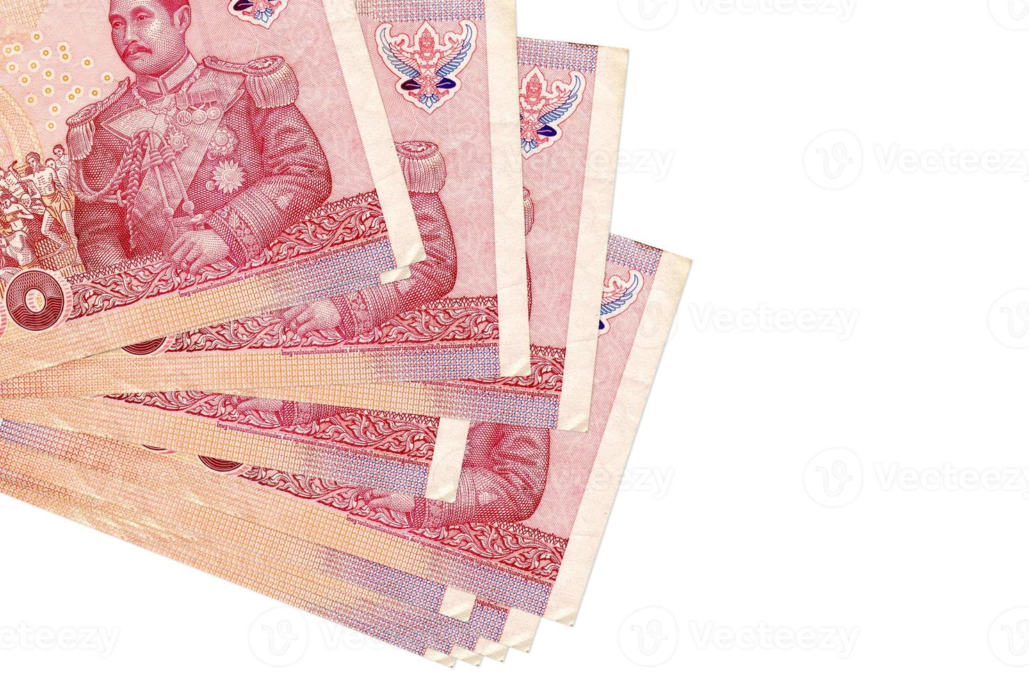 100 Thai Baht bills lies in small bunch or pack isolated on white. Mockup with copy space. Business and currency exchange photo