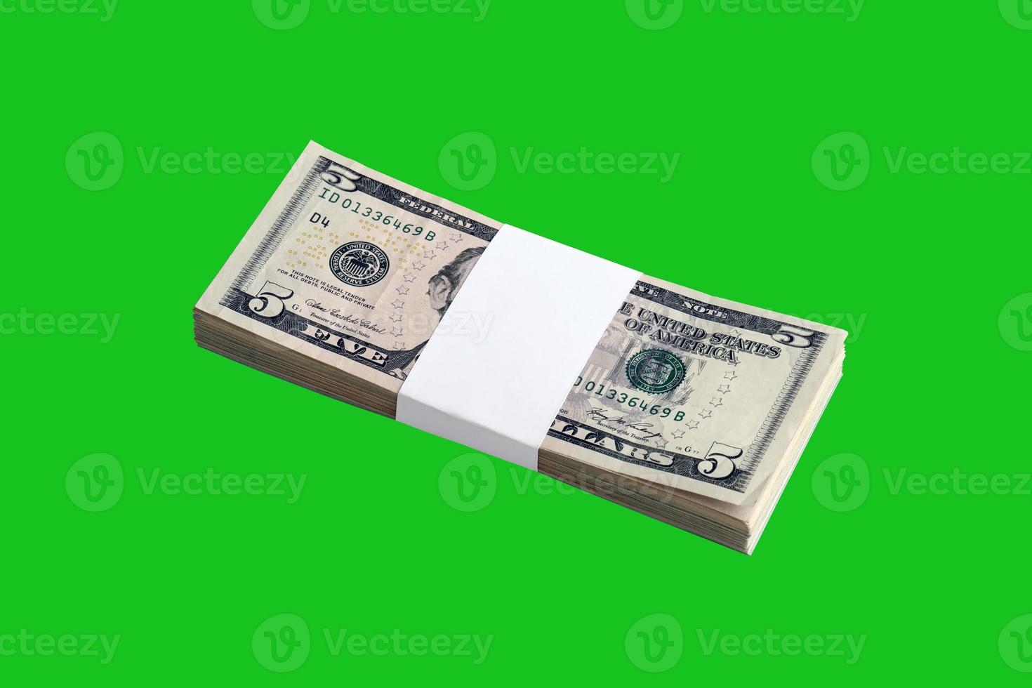 Bundle of US dollar bills isolated on chroma keyer green. Pack of american money with high resolution on perfect green mask photo