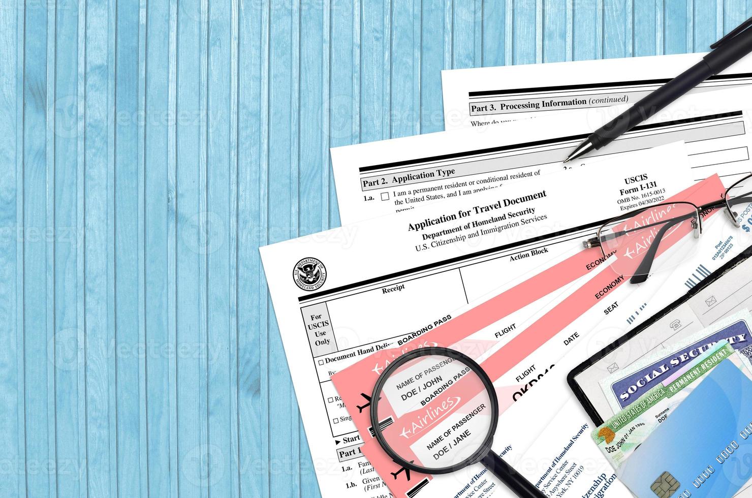 USCIS form I-131 Application for travel document lies on flat lay office table and ready to fill. U.S. Citizenship and Immigration services paperwork concept photo