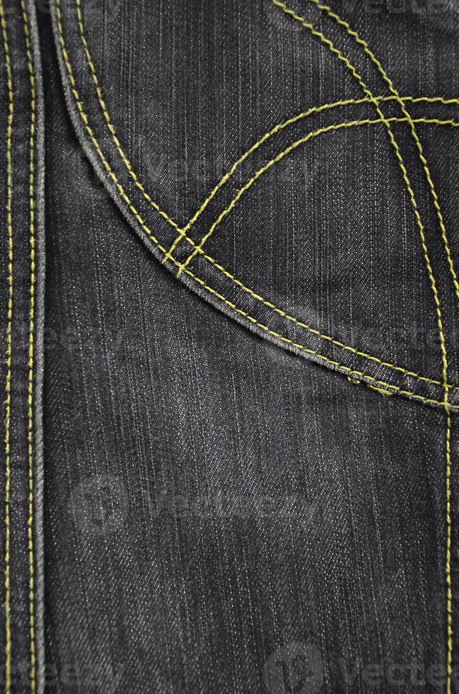 The texture of black denim cloth photo