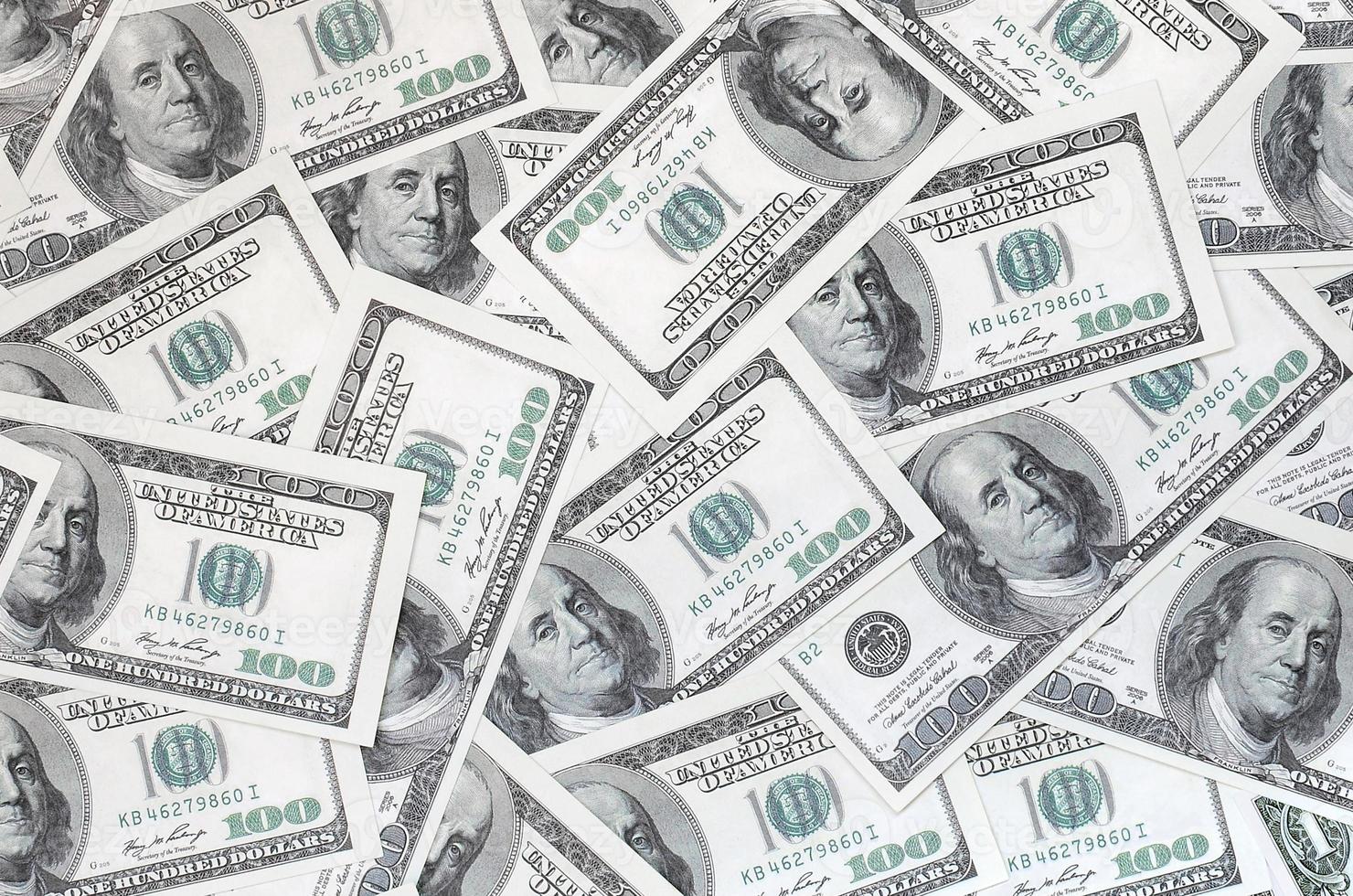 A pattern of many dollar bills. Background image photo