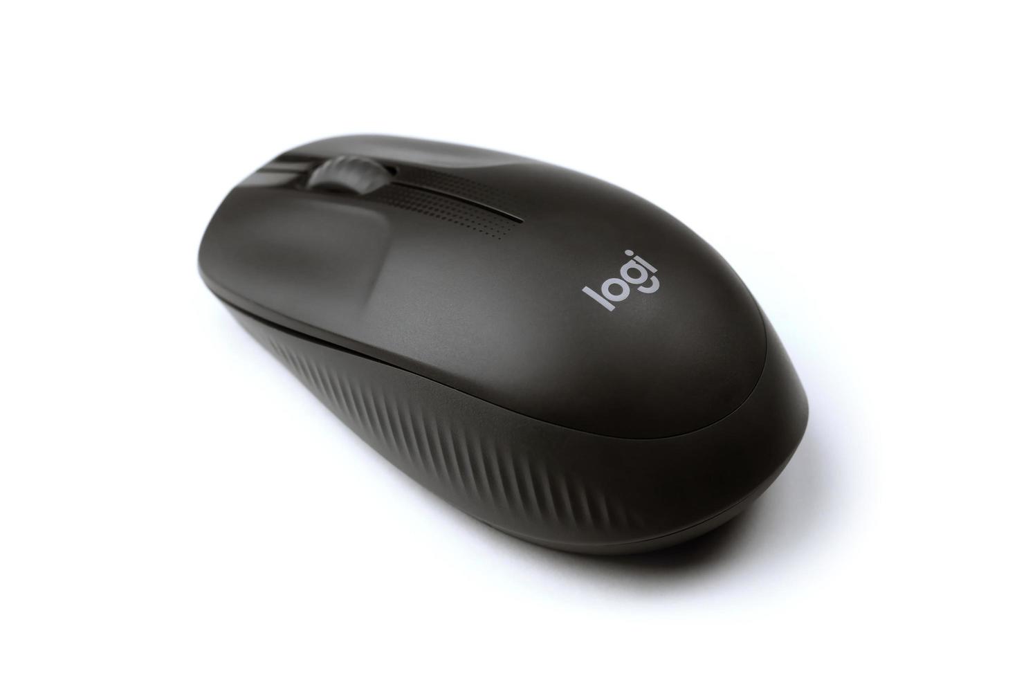 KHARKIV, UKRAINE - MARCH 5, 2021 Logitech wireless mouse on white background. Logitech is a Swiss multinational manufacturer of computer peripherals photo