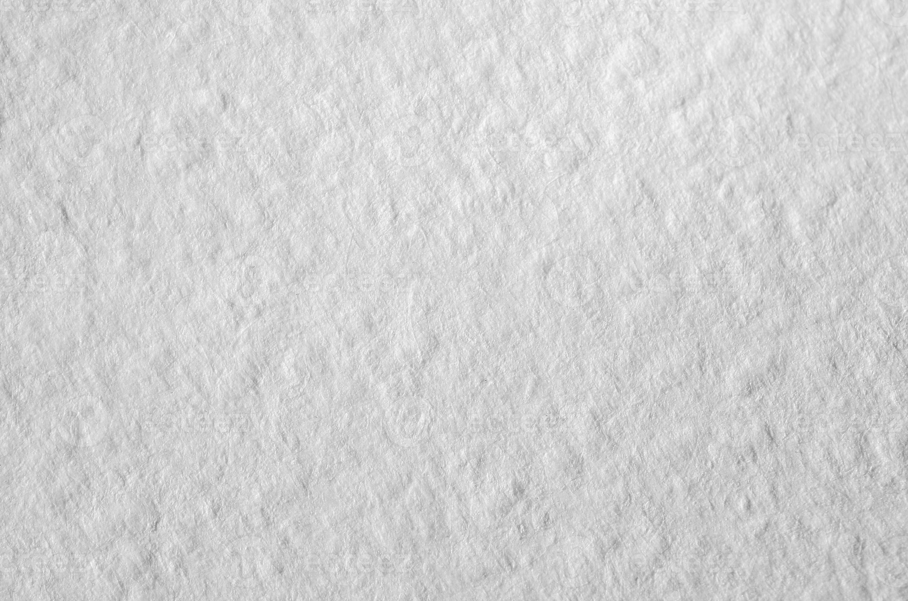 Texture of thick paper intended for watercolor painting. Macro snapshot of details of the relief