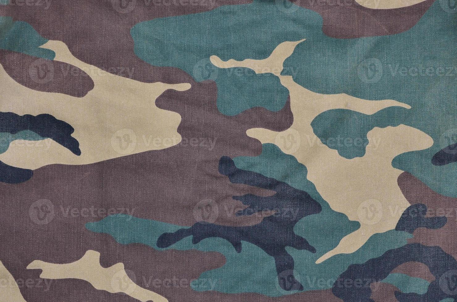 Textile pattern of military camouflage fabric photo