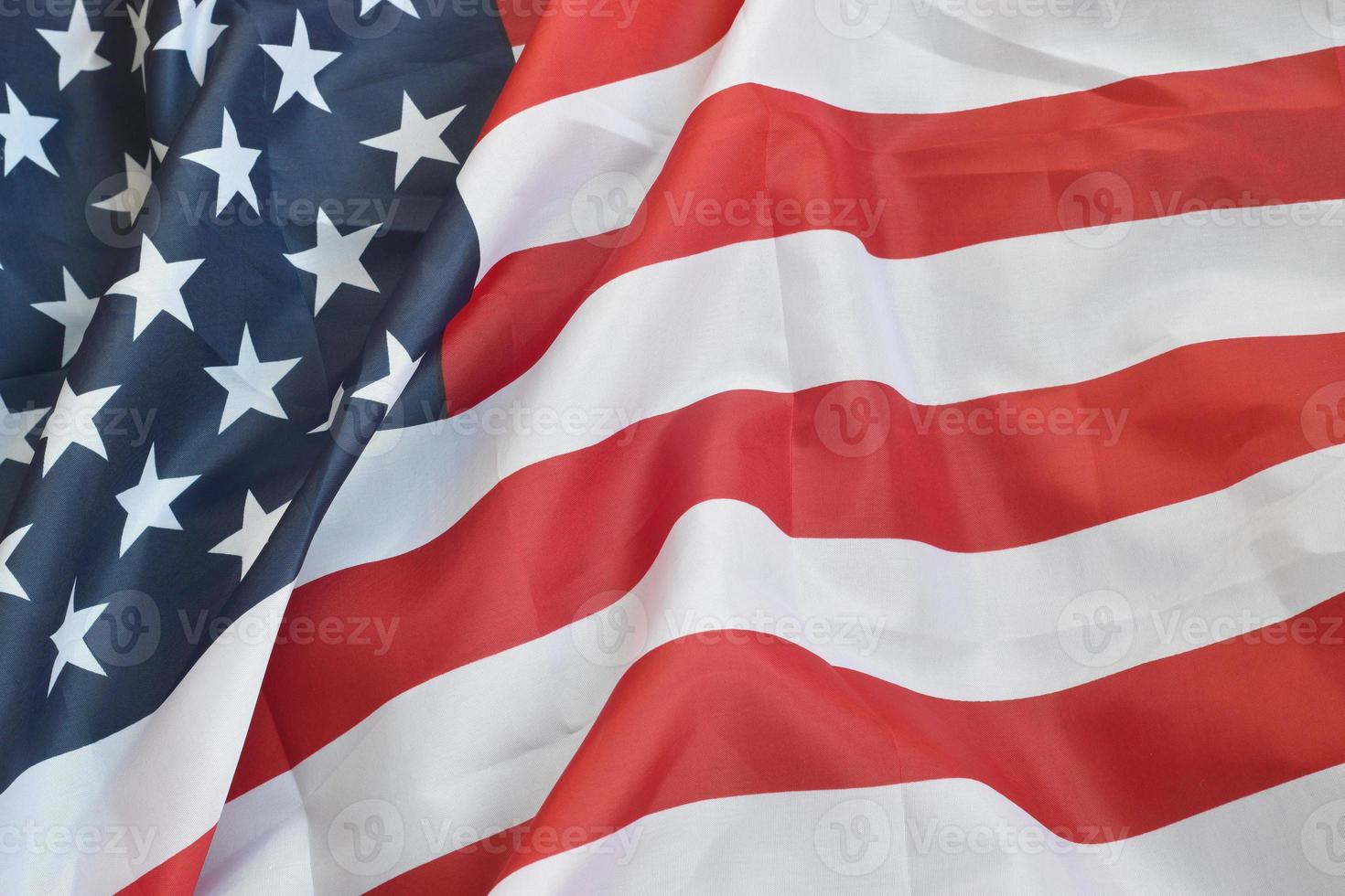 United States of America waving flag with many folds photo