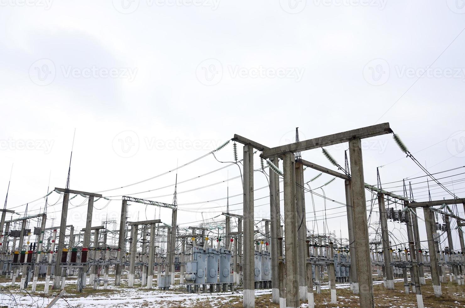 Power plant is a station of transformation. A lot of cables, poles and wires, transformers. Electro-energy. photo