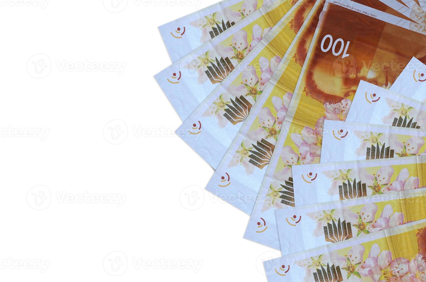 100 Israeli new shekels bills lies isolated on white background with copy space. Rich life conceptual background photo