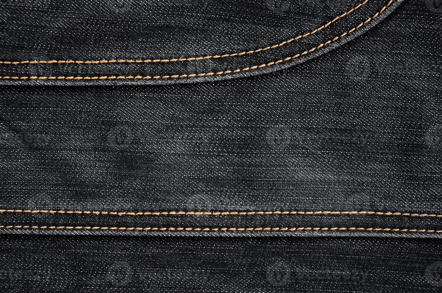 The texture of black denim cloth photo