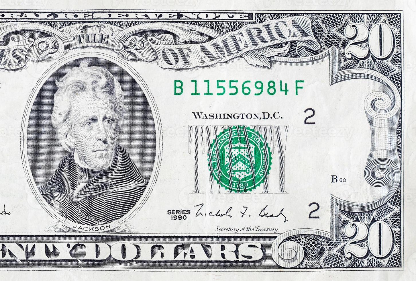 Portrait of US president Andrew Jackson on 20 dollars banknote closeup macro fragment photo