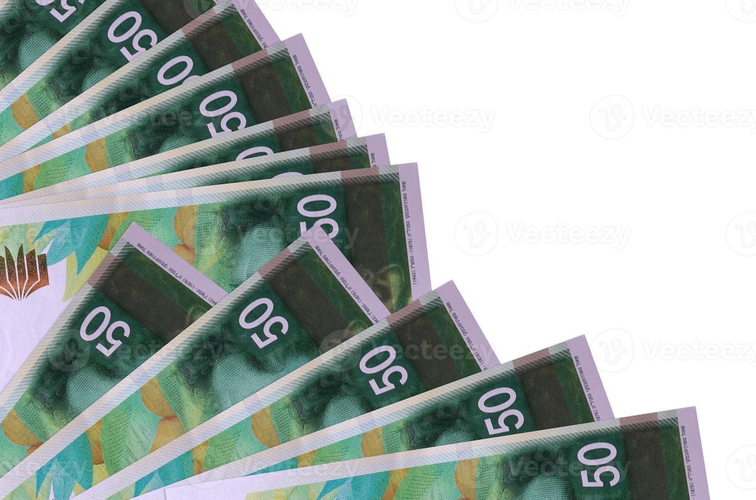 50 Israeli new shekels bills lies isolated on white background with copy space stacked in fan close up photo