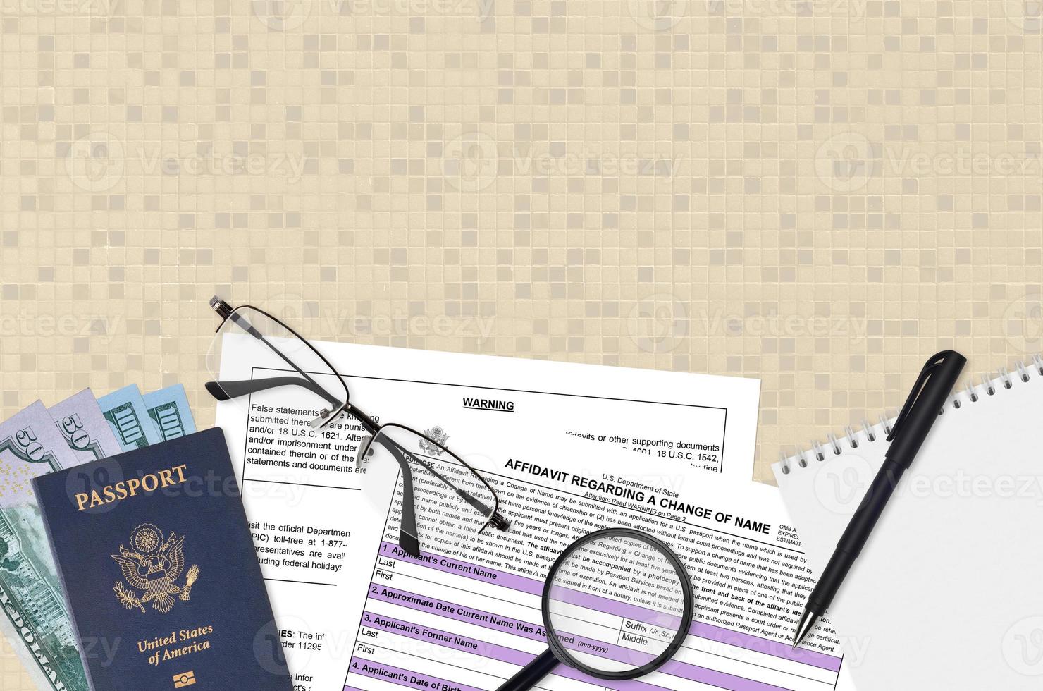Department of State form DS60 Affidavit Regarding a change of name lies on table and ready to fill. Paperwork during operations with US Passport concept photo