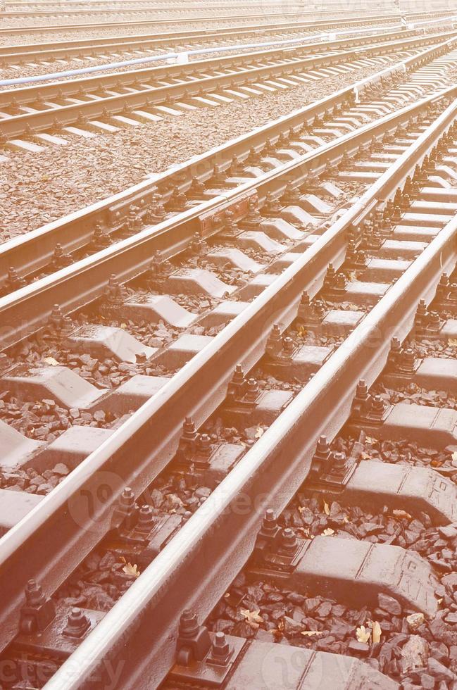 Photo fragment of the railroad tracks in the rainy weather