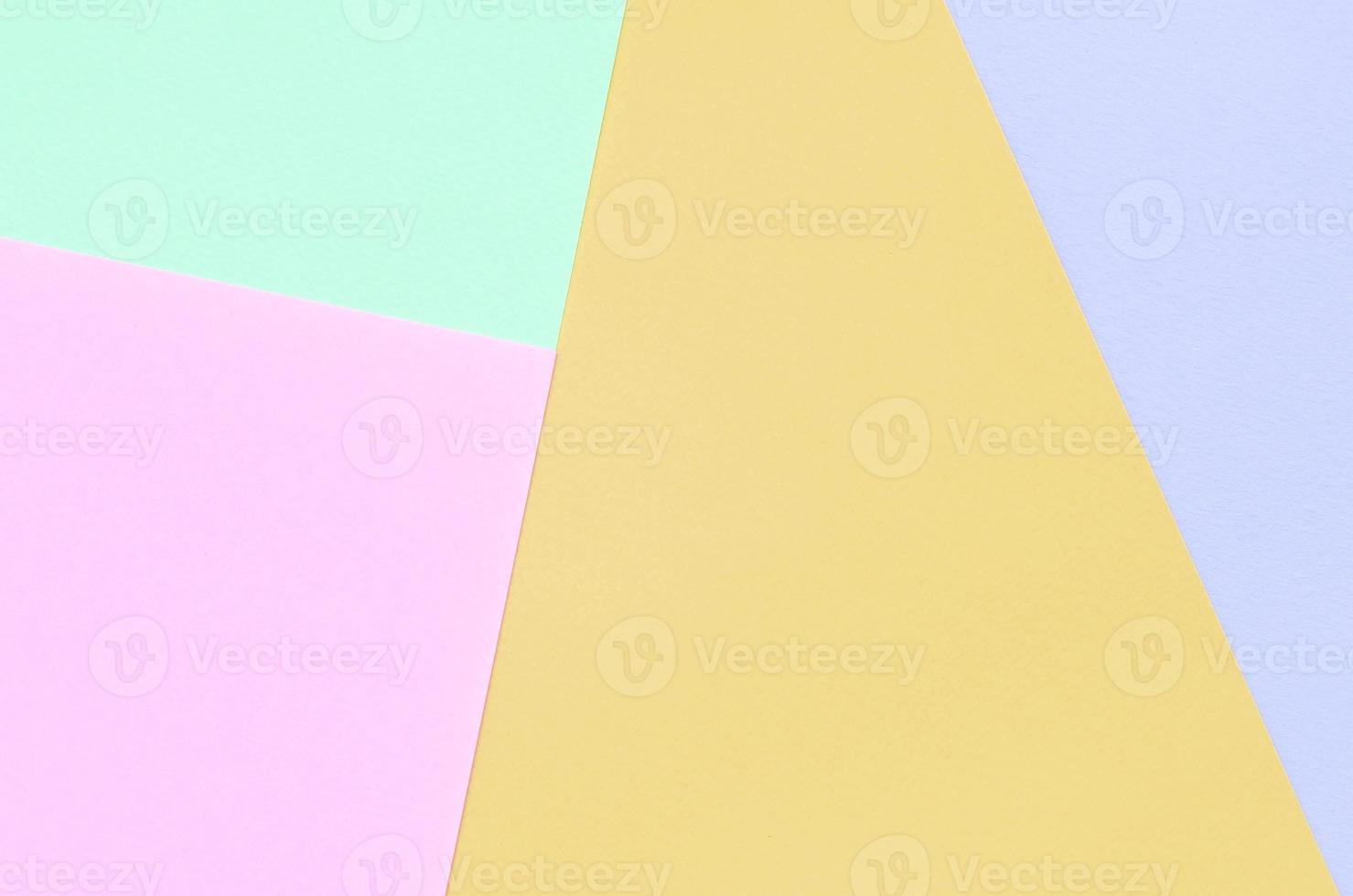 Texture background of fashion pastel colors. Pink, violet, orange and blue geometric pattern papers. photo