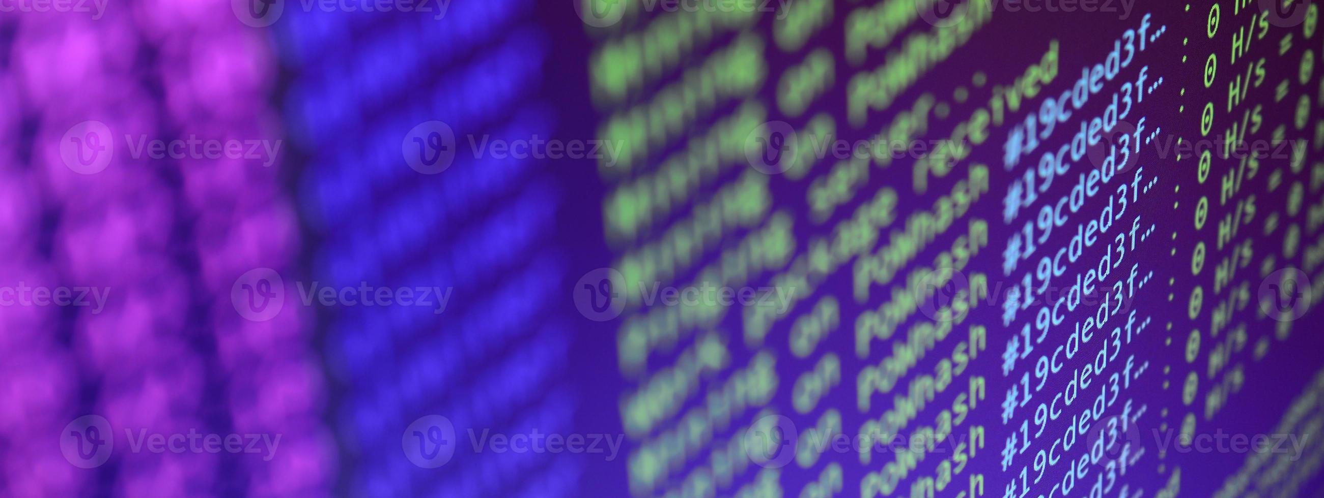 Macro snapshot of the program interface for crypto currency mining on the monitor of an office computer. The concept of mining bitcoins. The flow of information strings and data photo