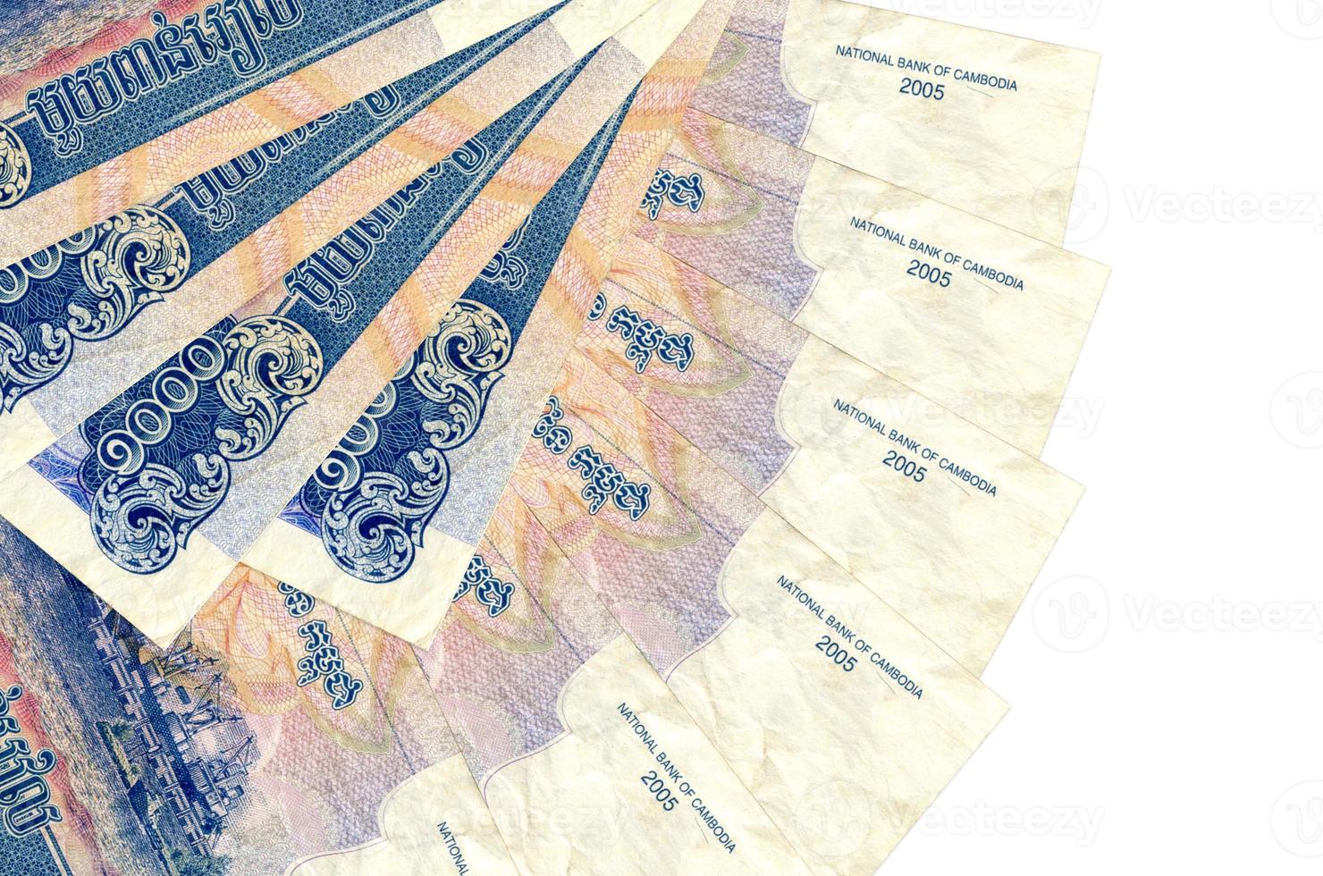 1000 Cambodian riels bills lies isolated on white background with copy space stacked in fan shape close up photo