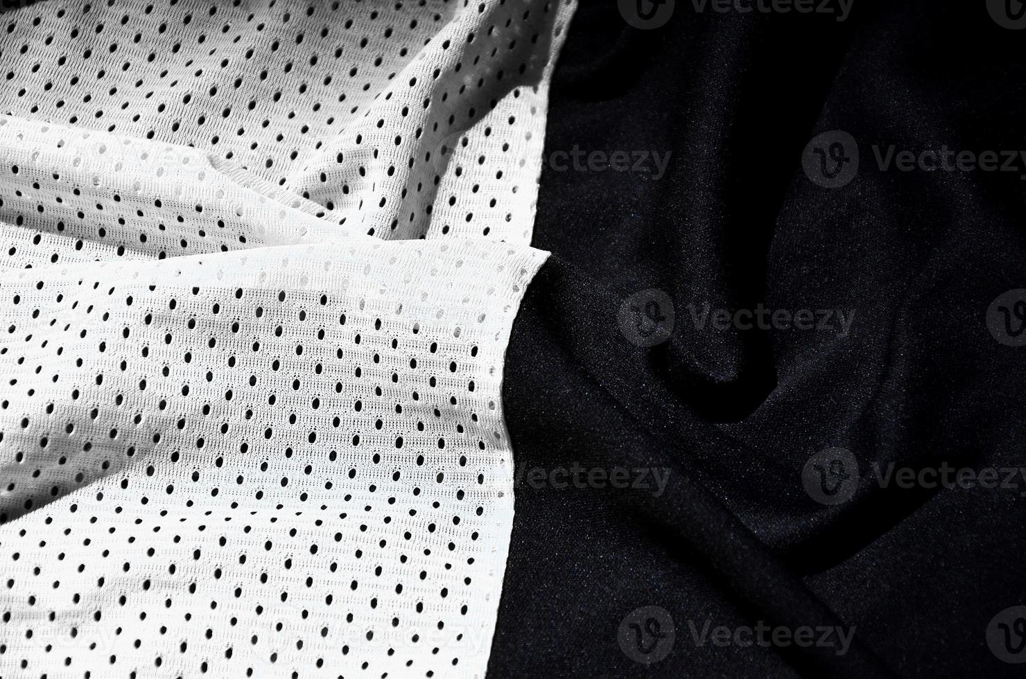 White sport clothing fabric texture background. Top view of white cloth textile surface. Bright basketball shirt. Text Space photo