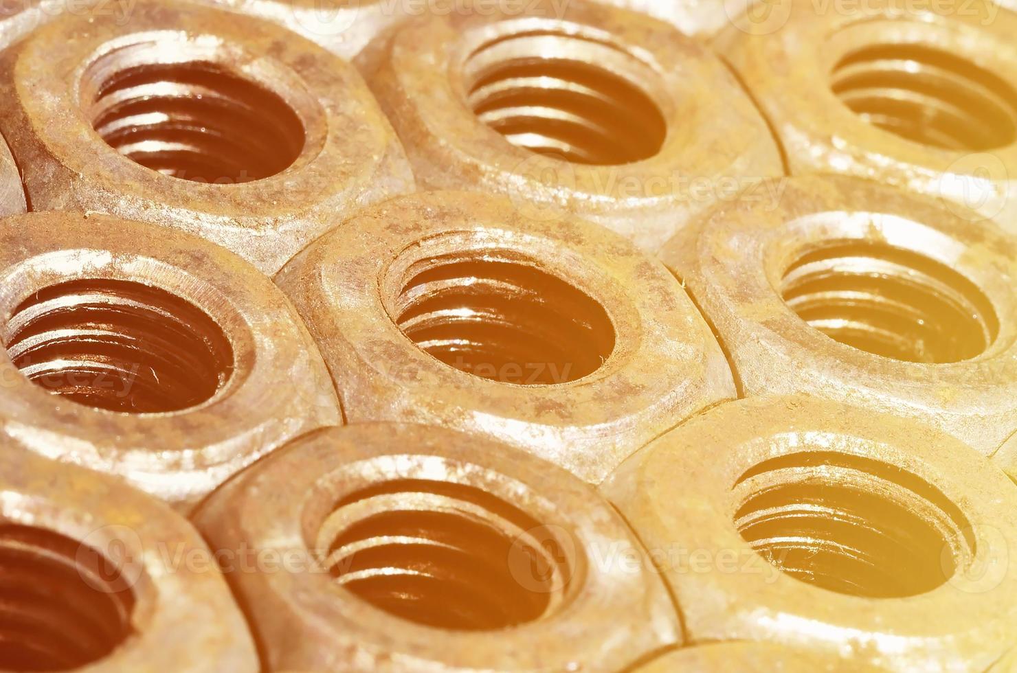 Close-up of rusty nuts photo