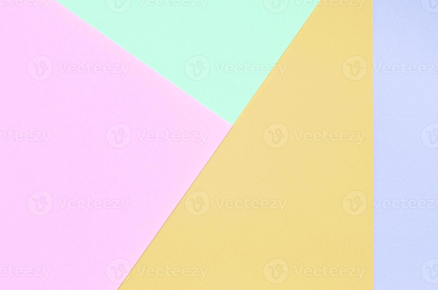 fondo de textura de colores pastel de moda. papeles con motivos geométricos rosas, violetas, naranjas y azules. foto