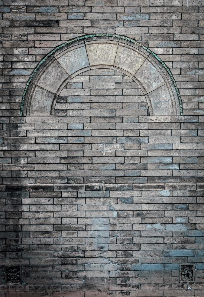 Rough Brick wall dark stone grunge Door and window pattern texture background. photo