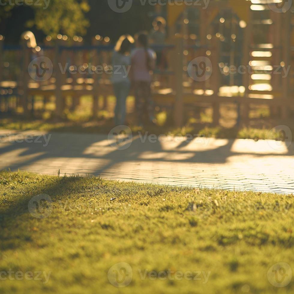 Blur playground in park abstract background. Film tone effect. photo