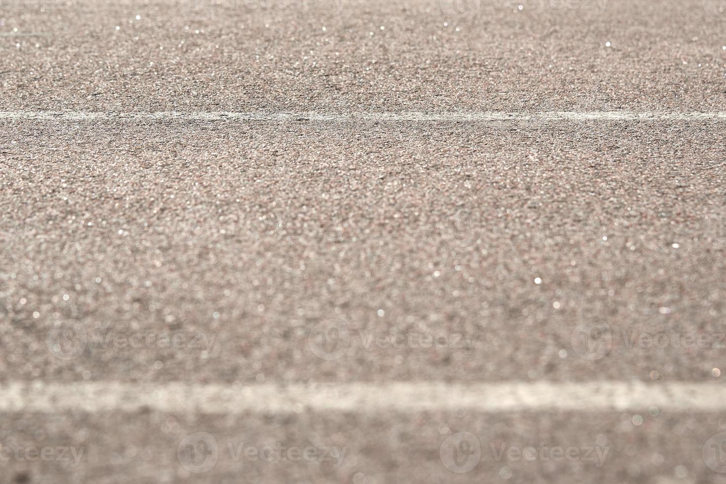 textura del asfalto de la carretera. el primer plano en el desenfoque. foto