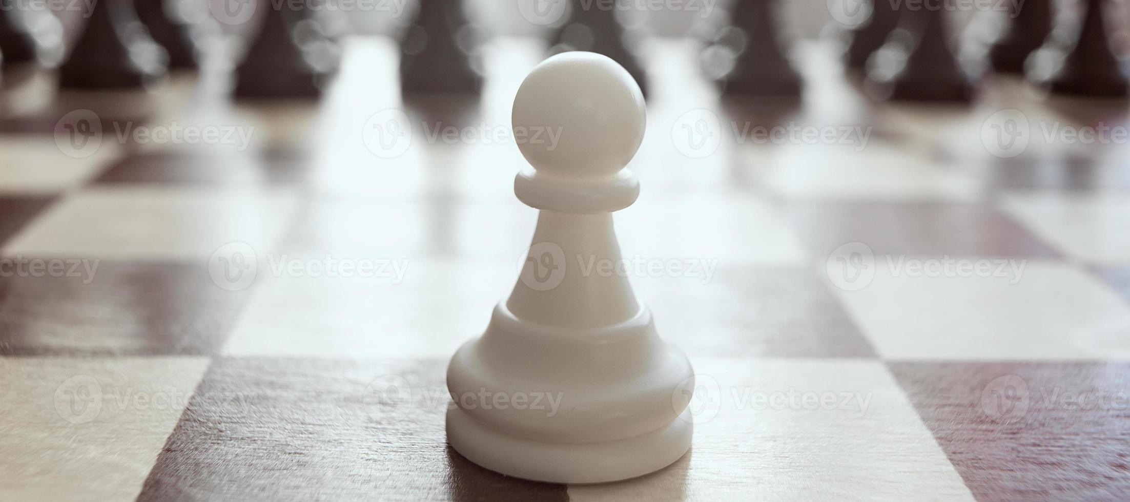 Single pawn against many enemies as a symbol of difficult unequal fight or struggle of minorities. photo