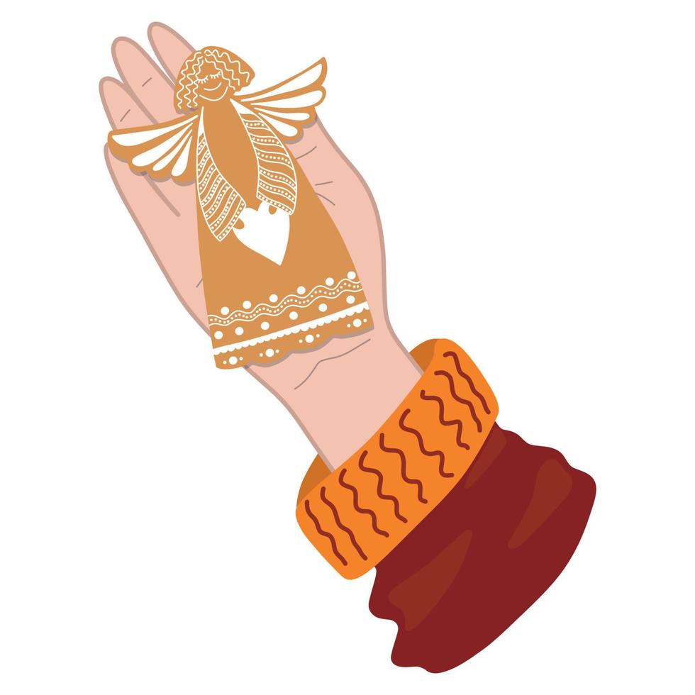 a hand with a Christmas gingerbread in the form of an angel. vector